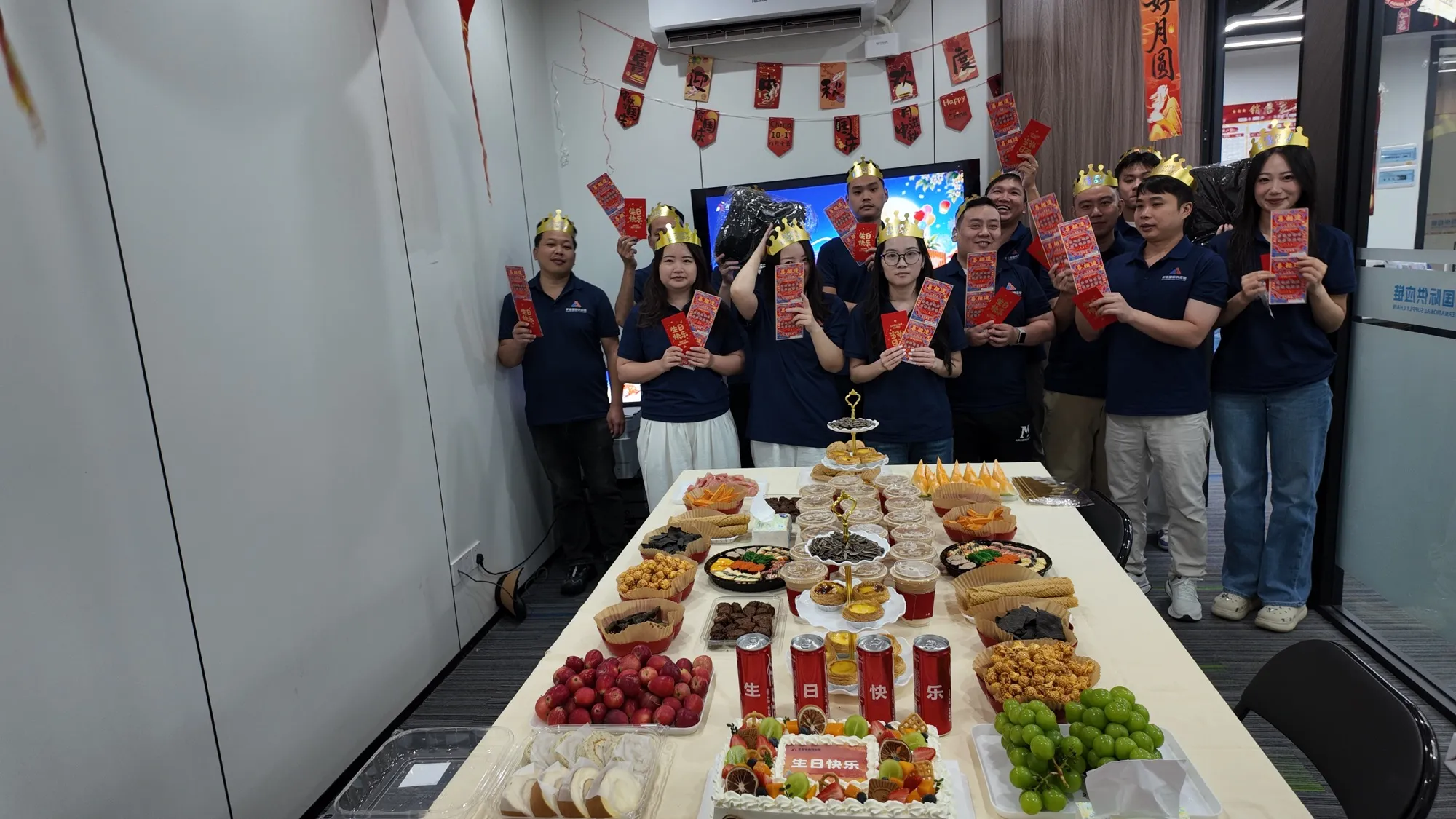 The ANJUN team celebrating together at the Longhua office